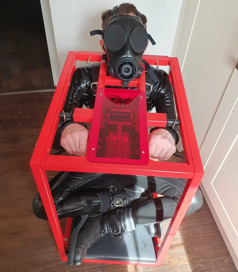 Trying out my new BDSM furniture in a rubber suit